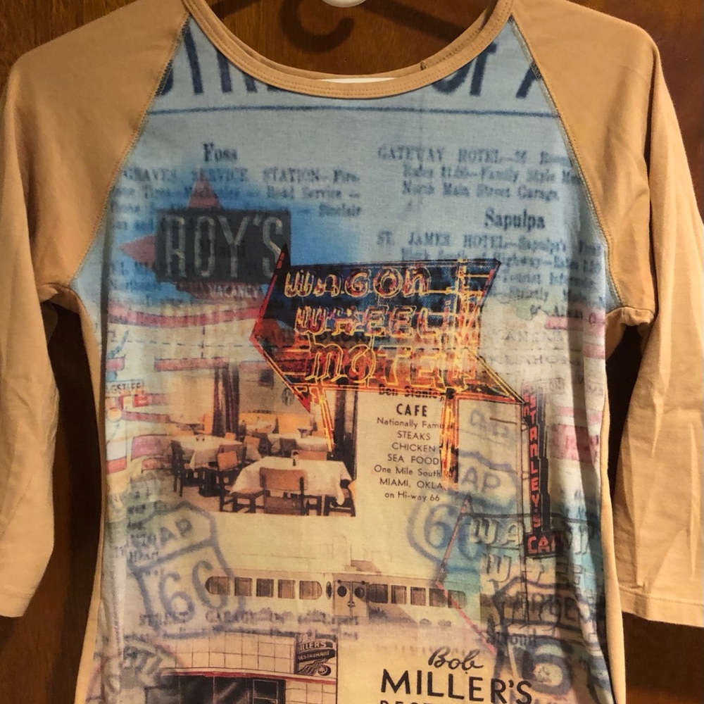 Top in Beige with retro style graphics